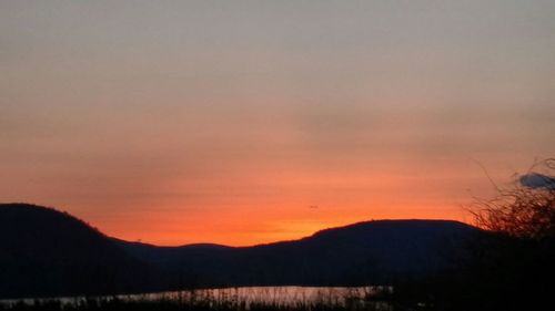 Scenic view of mountains at sunset