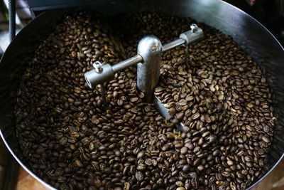 High angle view of coffee beans in water