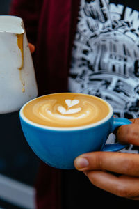 Close-up of coffee cup on table