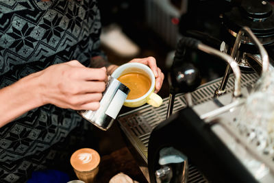 Man holding coffee cup