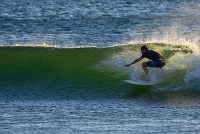 Man surfing in sea