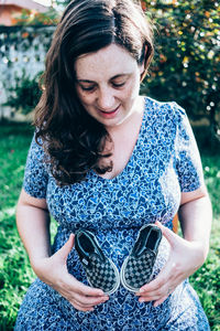 Close-up of young woman standing outdoors