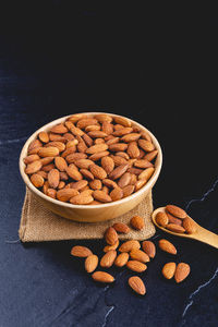 High angle view of breakfast on table against black background