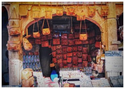 Low angle view of clothes hanging for sale