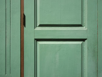 Full frame shot of closed green doors