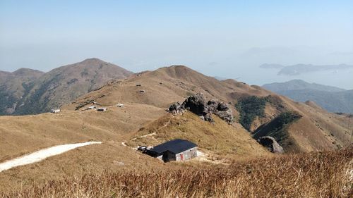 Scenic view of landscape and mountains against sky