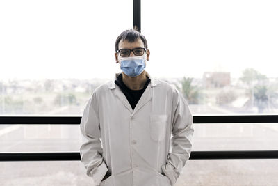 Male scientist in white coat