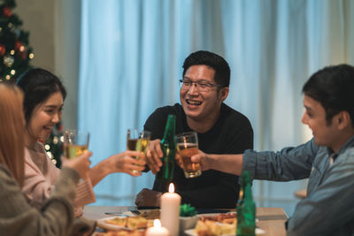 People sitting in a drinking glass