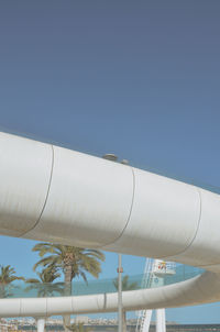 Low angle view of building against clear blue sky