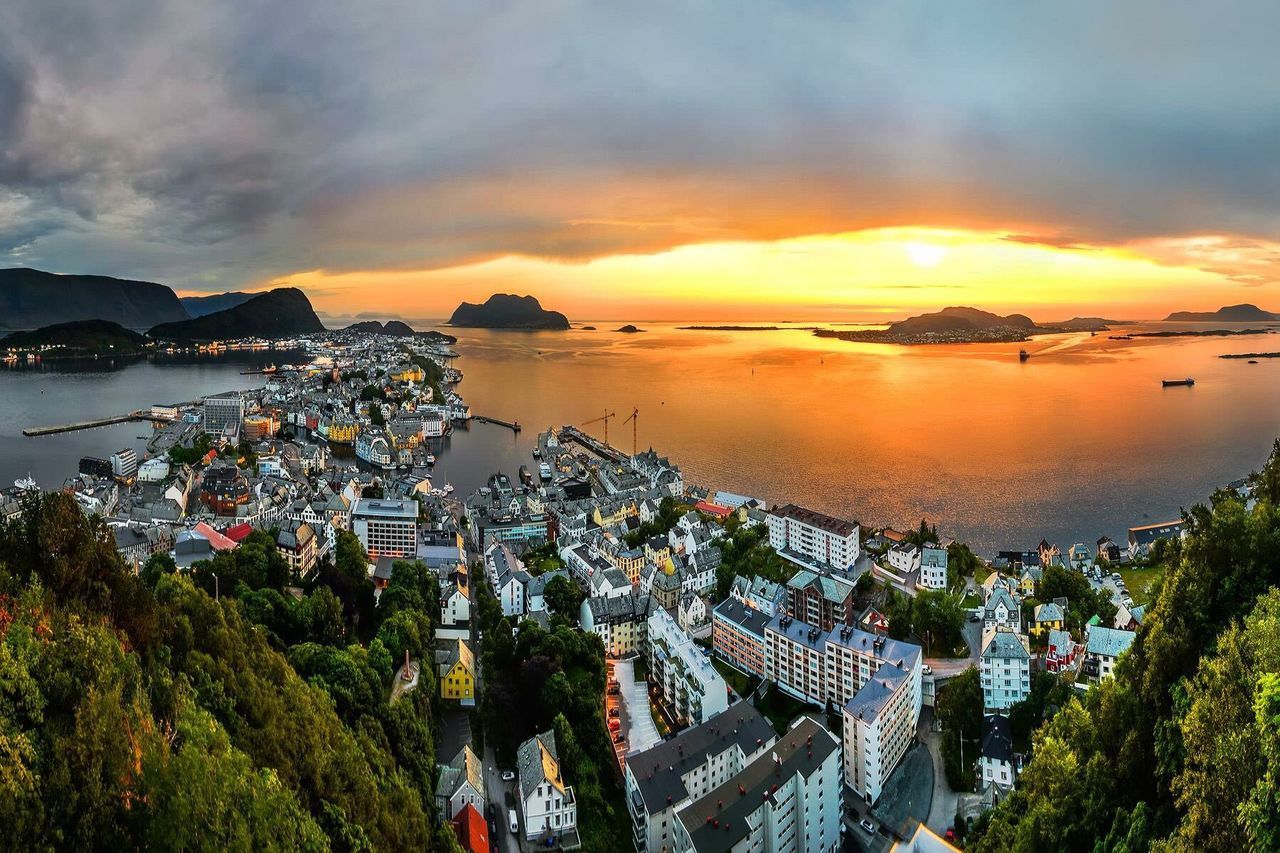 sunset, water, nautical vessel, tree, sea, outdoors, beauty in nature, harbor, yacht, no people, nature, mountain, cityscape