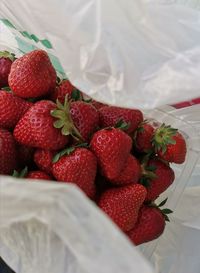 High angle view of strawberries on table