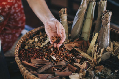 Midsection of woman preparing food