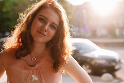 Portrait of smiling teenage girl looking at camera