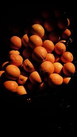 Close-up of fruits on black background