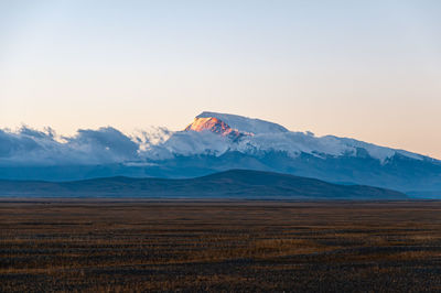 Snow mountain landscape at sunrise in tibet