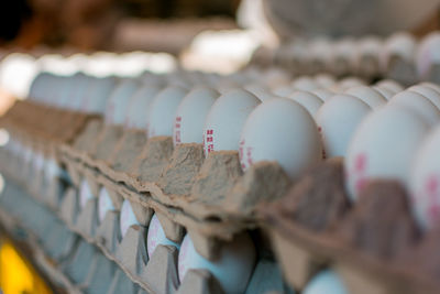 Close-up of eggs for sale at market stall