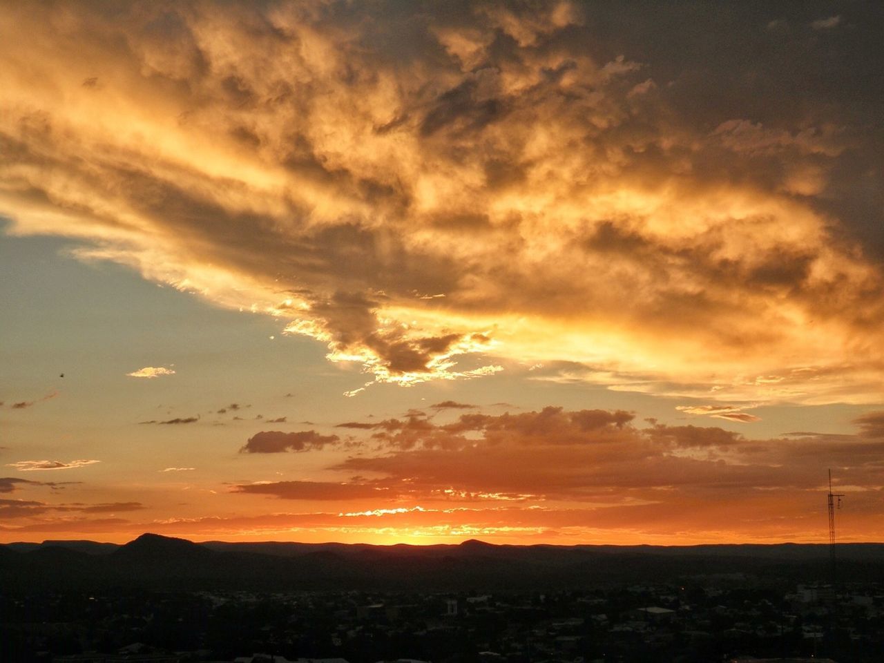 sunset, silhouette, scenics, sky, orange color, beauty in nature, tranquil scene, tranquility, cloud - sky, landscape, idyllic, nature, mountain, dramatic sky, cloud, sun, outdoors, no people, moody sky, sunlight