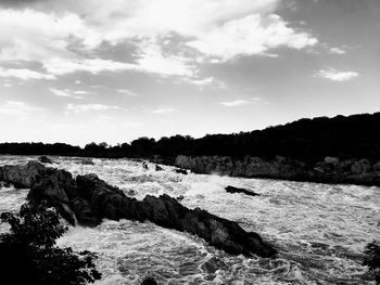 Scenic view of river against sky