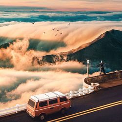 High angle view of vehicles on road against sky
