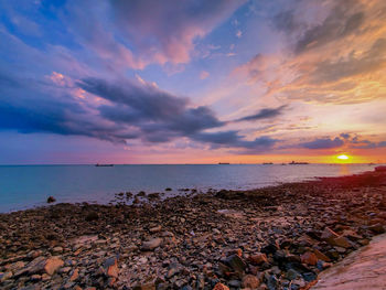 Scenic view of sea against sky during sunset
