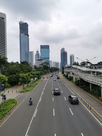 High angle view of city street against sky