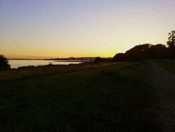 Scenic view of calm sea at sunset