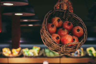 Close-up of fruits in basket on table