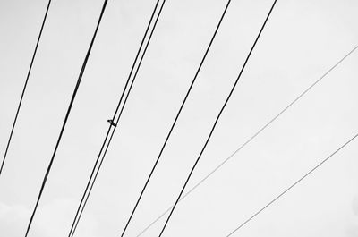 Low angle view of electricity pylon