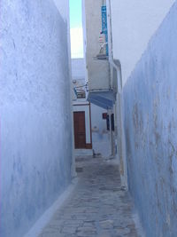 Narrow alley along buildings