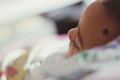 Headshot of a baby girl sleeping peacefully