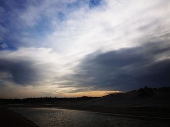 Scenic view of landscape against sky during sunset