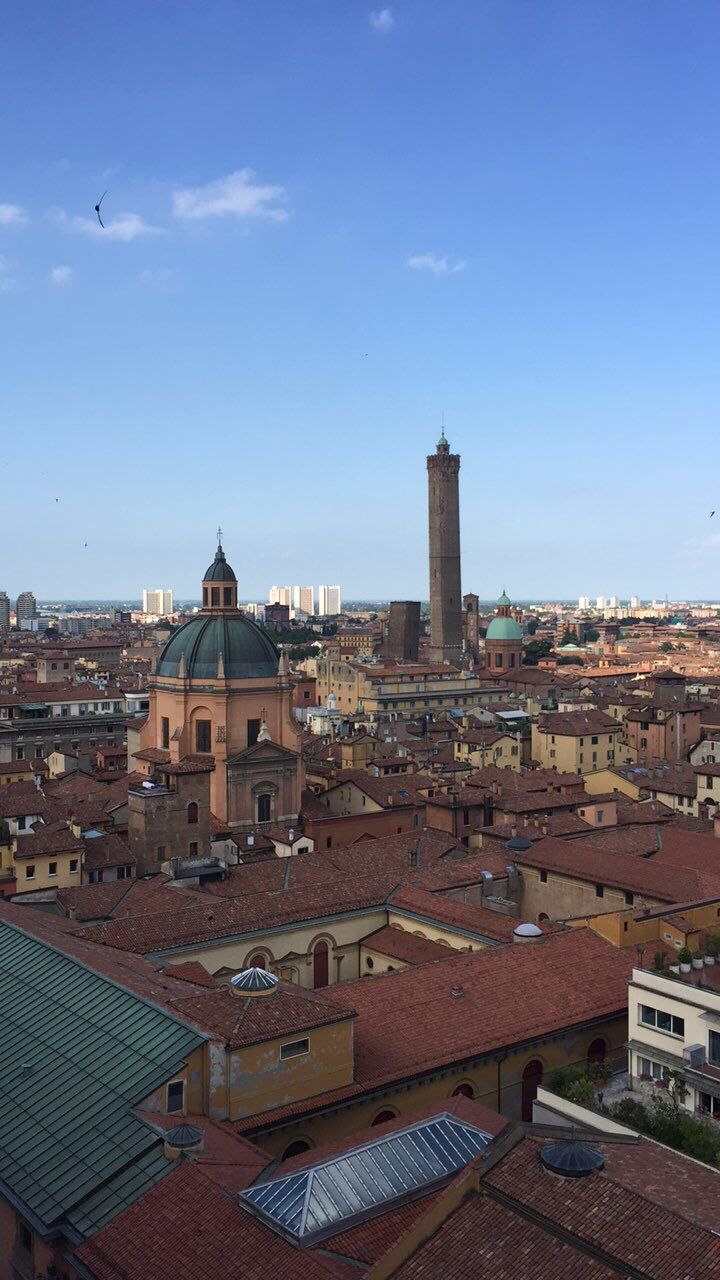 architecture, roof, building exterior, sky, city, built structure, no people, cityscape, day, outdoors