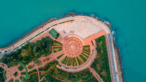 High angle view of swimming pool by sea