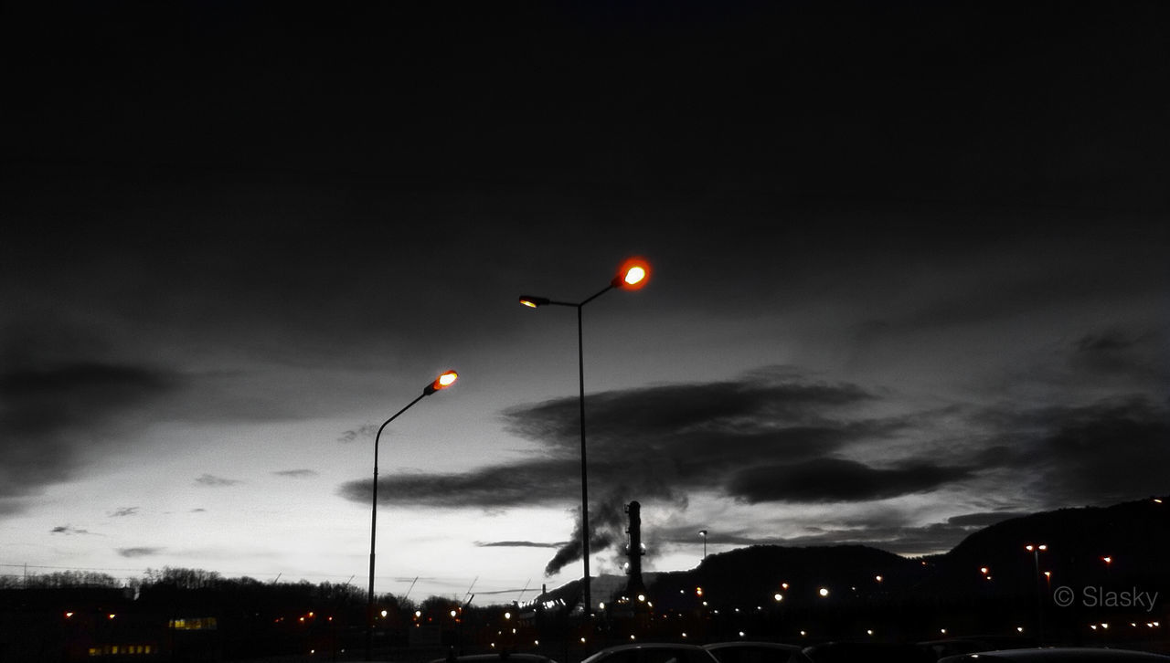 sky, street light, illuminated, night, low angle view, cloud - sky, lighting equipment, dusk, cloudy, weather, overcast, silhouette, storm cloud, dramatic sky, cloud, outdoors, light - natural phenomenon, no people, street, nature