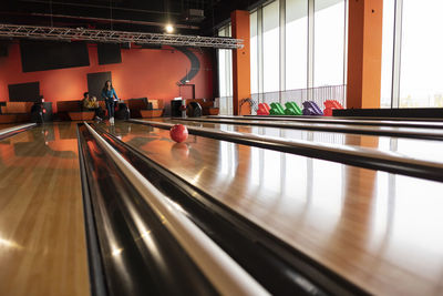 Woman playing bowling at alley