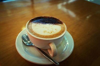 Close-up of coffee cup on table