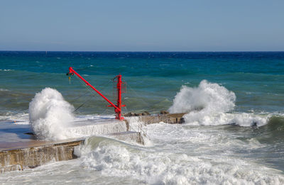 Scenic view of sea against clear sky