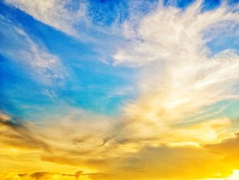 Low angle view of dramatic sky during sunset