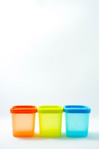 Close-up of colorful stack against white background