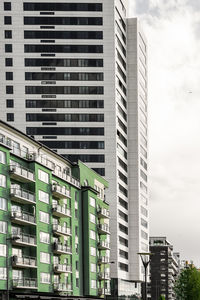 Low angle view of office building against sky