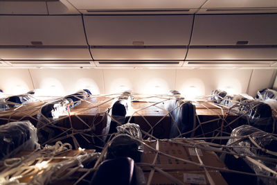 Cargo on seats in a passenger plane