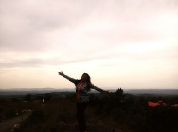 Woman standing on landscape