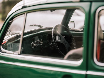 Reflection of car on side-view mirror