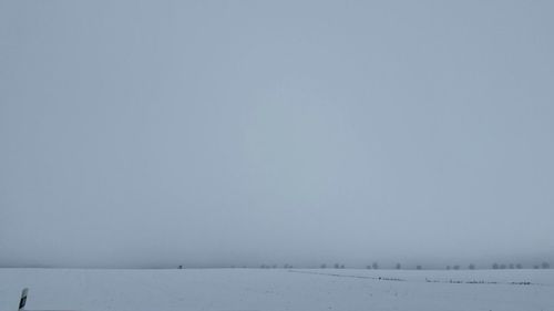 Scenic view of snow covered landscape