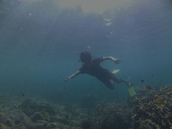 Man swimming in sea