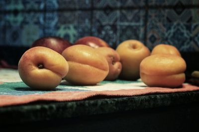 Close-up of apples on table