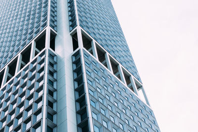 Low angle view of modern building against clear sky