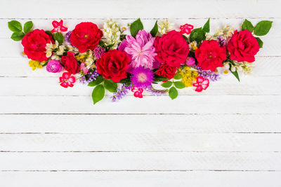 Directly above shot of pink flowering plants on table