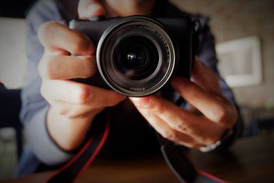 Midsection of man photographing