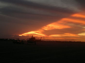 Scenic view of dramatic sky during sunset